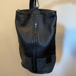 Calvin Klein single strap faux leather backpack